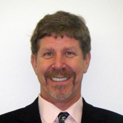 Smiling man in a suit and tie